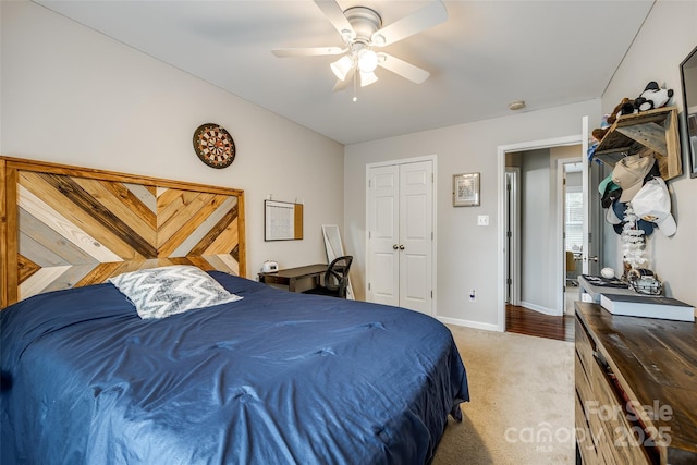 1206 Craig Ave, Lancaster, SC 29720 - bedroom featuring light carpet, baseboards, a ceiling fan, and a closet