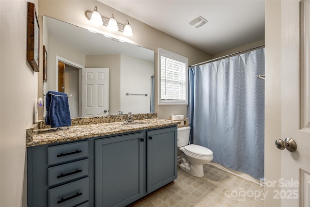 1206 Craig Ave, Lancaster, SC 29720 - bathroom with toilet, vanity, and curtained shower