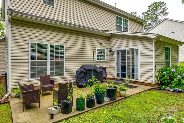 1206 Craig Ave, Lancaster, SC 29720 - rear view of property with a patio area