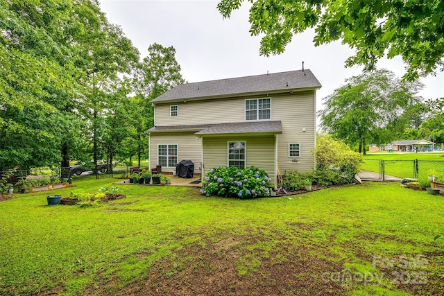 1206 Craig Ave, Lancaster, SC 29720 - rear view of property with a patio and a gate