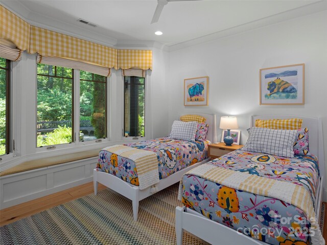 24 Deep Creek Trl, Arden, NC 28704 - bedroom with ornamental molding, multiple windows, wood finished floors, a ceiling fan, and recessed lighting