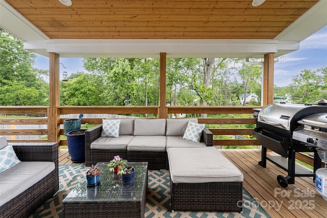 307 Hazel Mill Rd, Asheville, NC 28806 - wooden terrace featuring an outdoor hangout area and view of wooded area