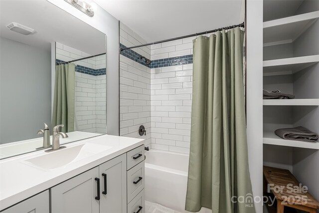 307 Hazel Mill Rd, Asheville, NC 28806 - bathroom featuring vanity and shower / tub combo with curtain