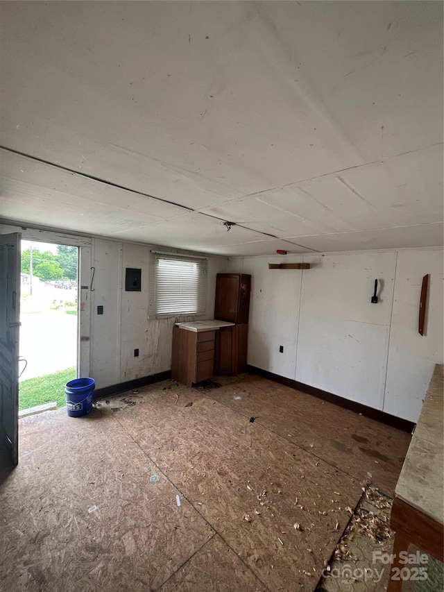 8720 Lee St, Mount Pleasant, NC 28124 - unfurnished living room with baseboards