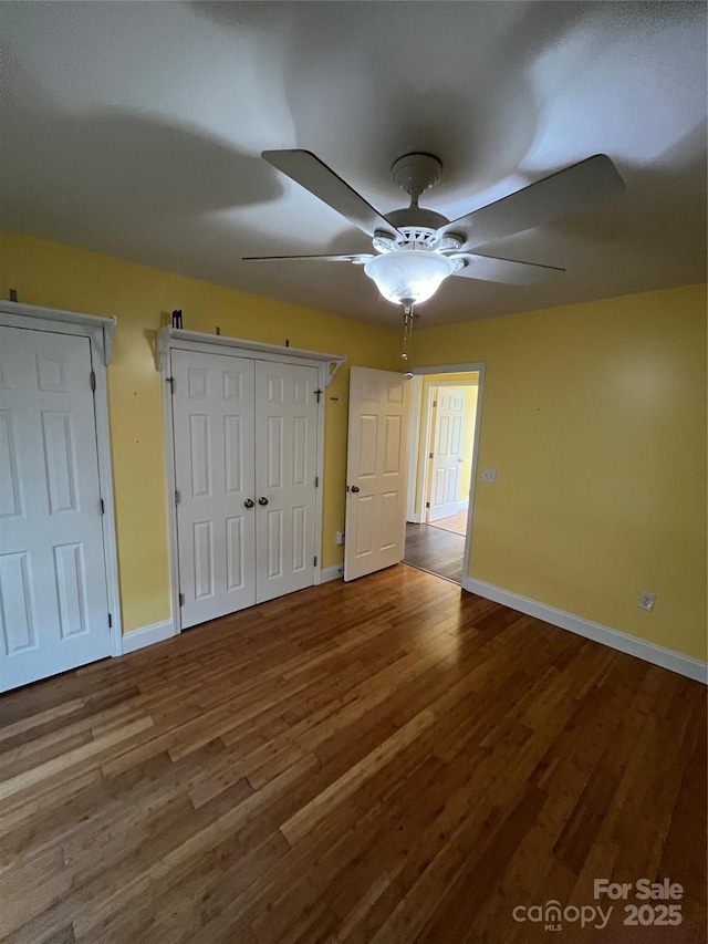 8720 Lee St, Mount Pleasant, NC 28124 - unfurnished bedroom featuring wood finished floors and ceiling fan