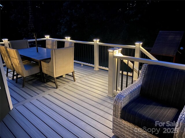 645 Brookhaven Dr, Fort Mill, SC 29708 - deck at night with outdoor dining space