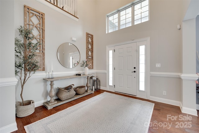645 Brookhaven Dr, Fort Mill, SC 29708 - entryway with wood finished floors, healthy amount of natural light, a high ceiling, and baseboards