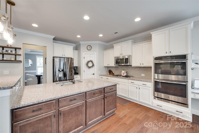 645 Brookhaven Dr, Fort Mill, SC 29708 - kitchen featuring stainless steel appliances, crown molding, white cabinetry, open shelves, and recessed lighting