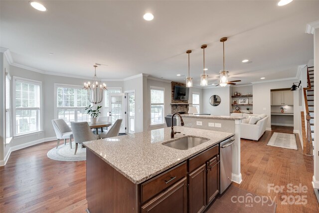 645 Brookhaven Dr, Fort Mill, SC 29708 - kitchen featuring a sink, dishwasher, open floor plan, wood finished floors, and a ceiling fan