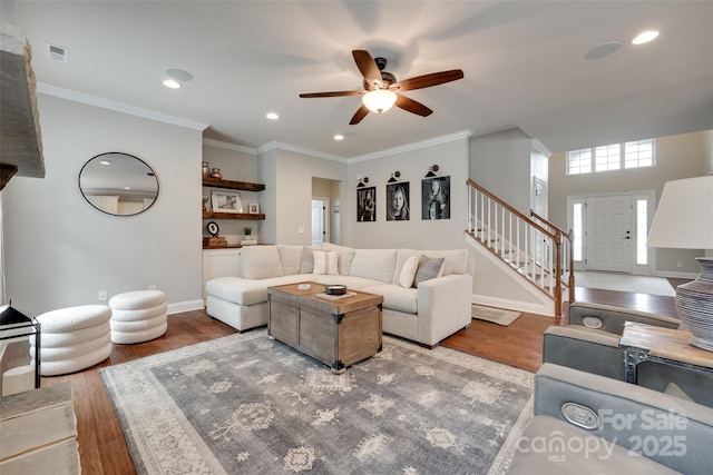 645 Brookhaven Dr, Fort Mill, SC 29708 - living room with wood finished floors, stairs, a ceiling fan, recessed lighting, and crown molding