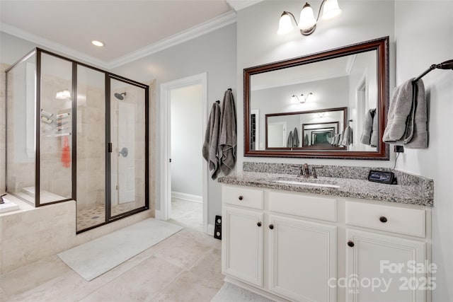 645 Brookhaven Dr, Fort Mill, SC 29708 - full bathroom with a shower stall, vanity, crown molding, recessed lighting, and baseboards