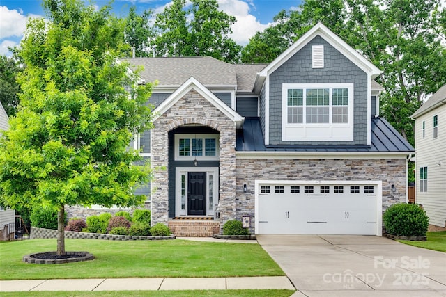 645 Brookhaven Dr, Fort Mill, SC 29708 - craftsman inspired home with a standing seam roof, concrete driveway, a front yard, a garage, and stone siding