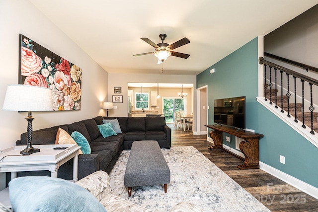 2045 13th St NE Unit 3, Hickory, NC 28601 - living area featuring dark wood finished floors, ceiling fan, stairs, a chandelier, and baseboards