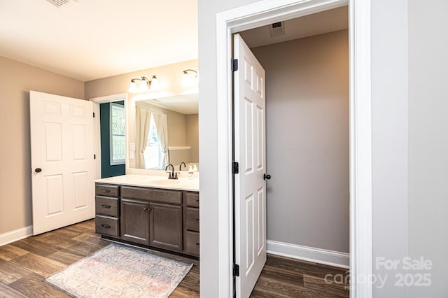 2045 13th St NE Unit 3, Hickory, NC 28601 - bathroom featuring baseboards, vanity, and wood finished floors