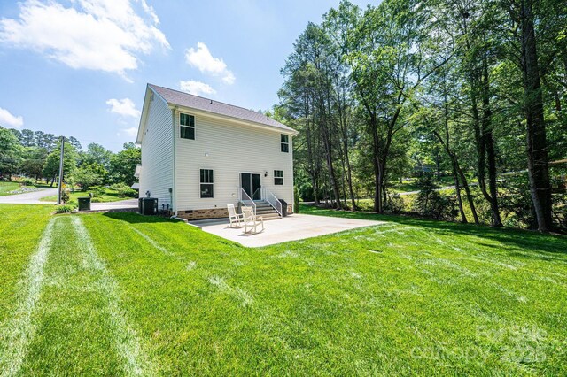 2045 13th St NE Unit 3, Hickory, NC 28601 - rear view of house featuring entry steps, a patio, central AC unit, a yard, and crawl space