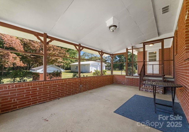 5170 Woodleaf Rd, Salisbury, NC 28147 - unfurnished sunroom featuring vaulted ceiling and healthy amount of natural light