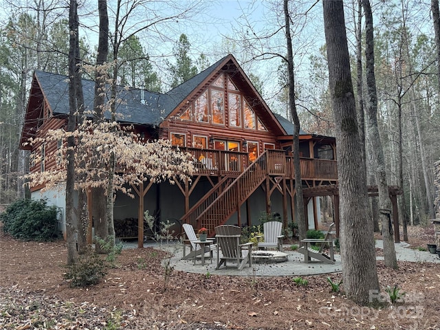 650 Mcdowell Rd, Columbus, NC 28722 - rear view of house with stairway, a patio area, a wooden deck, log exterior, and a shingled roof