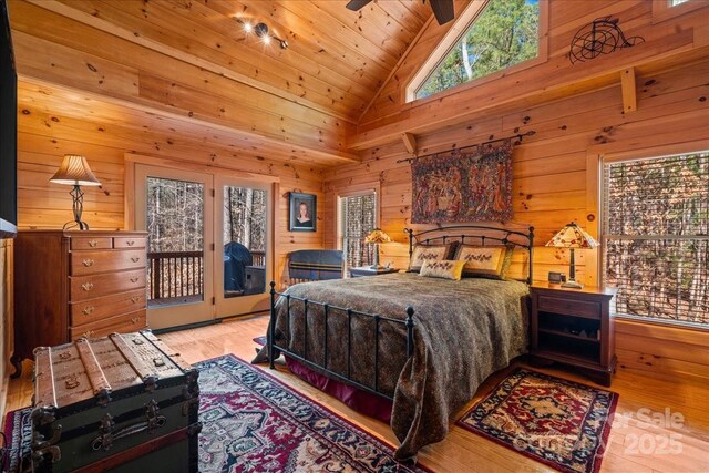 650 Mcdowell Rd, Columbus, NC 28722 - bedroom featuring access to outside, wood finished floors, wood walls, wood ceiling, and high vaulted ceiling