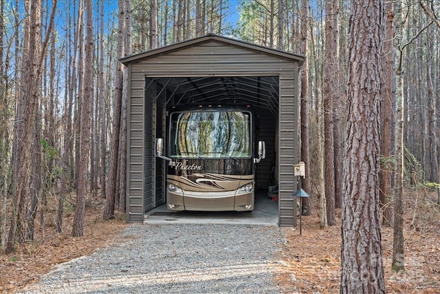 650 Mcdowell Rd, Columbus, NC 28722 - view of outbuilding featuring driveway and a detached carport