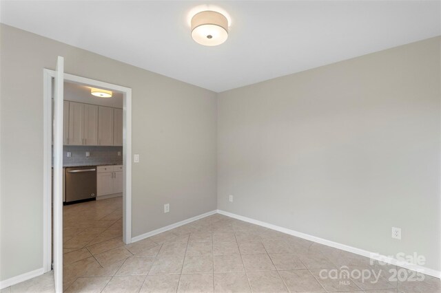 2666 Providence Dr, Gastonia, NC 28052 - spare room featuring light tile patterned floors and baseboards