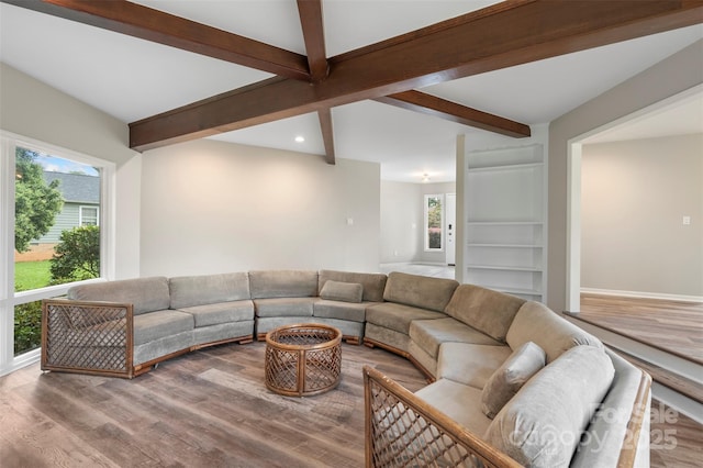 2666 Providence Dr, Gastonia, NC 28052 - living room featuring beam ceiling, plenty of natural light, wood finished floors, recessed lighting, and baseboards