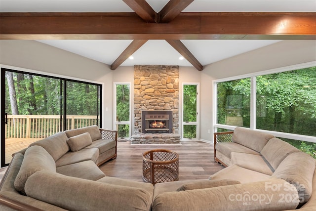 2666 Providence Dr, Gastonia, NC 28052 - living room featuring beamed ceiling, a stone fireplace, wood finished floors, baseboards, and recessed lighting