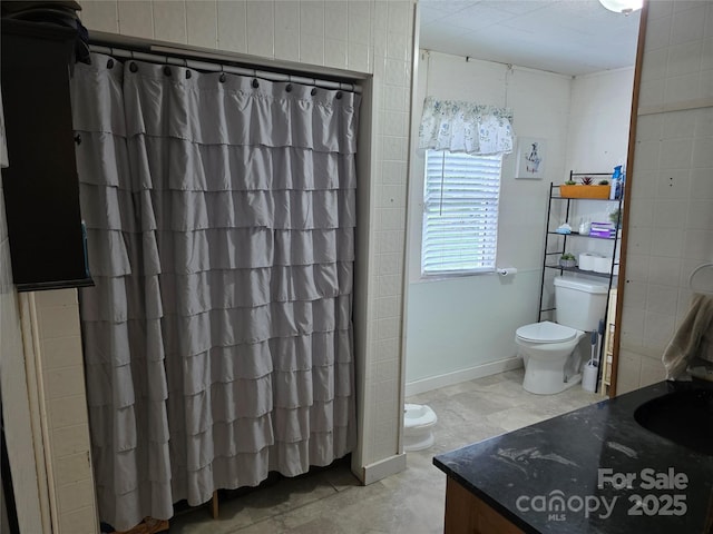 23 Pearl St, Granite Falls, NC 28630 - bathroom with toilet, vanity, and a shower with shower curtain