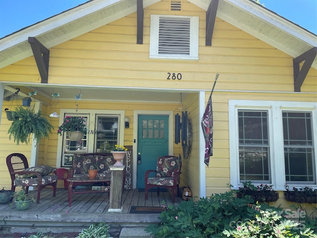 280 Walnut Ave, Spruce Pine, NC 28777 - view of exterior entry with a porch