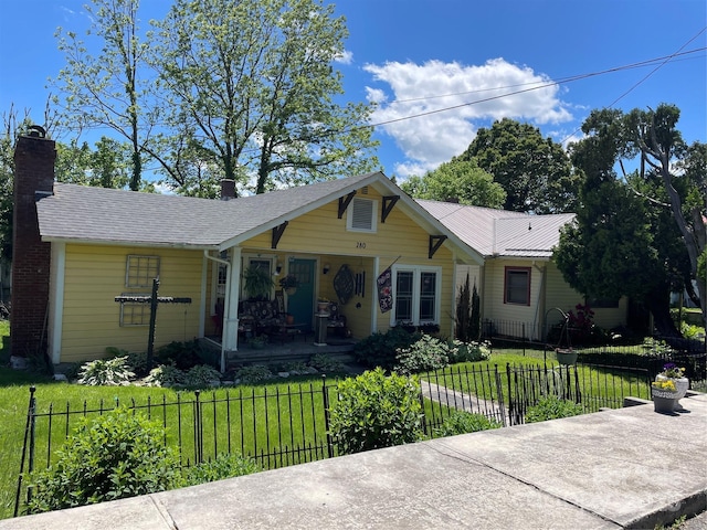 280 Walnut Ave, Spruce Pine, NC 28777 - view of front facade featuring a porch and a chimney
