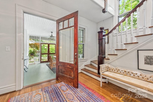 1801 E 8th St, Charlotte, NC 28204 - foyer featuring wood finished floors, ceiling fan, and stairs