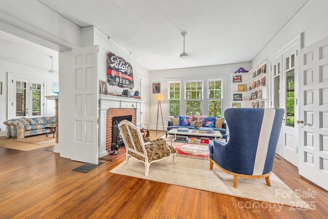 1801 E 8th St, Charlotte, NC 28204 - living area with wood finished floors and a fireplace