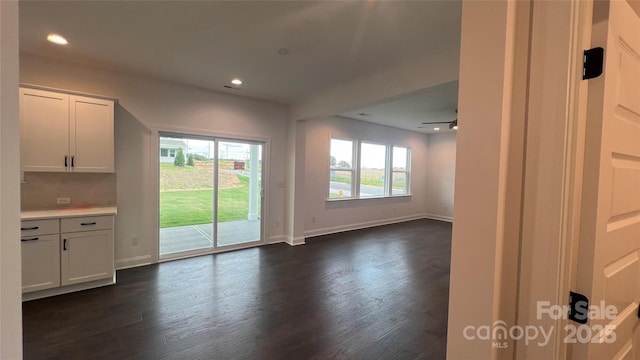 102 Cartington Way Unit Haf0042, Mooresville, NC 28115 - unfurnished living room featuring recessed lighting and dark wood-style flooring