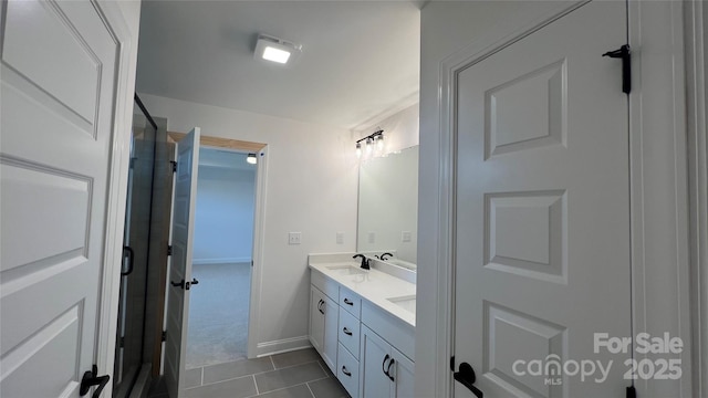 102 Cartington Way Unit Haf0042, Mooresville, NC 28115 - bathroom with double vanity and tile patterned floors