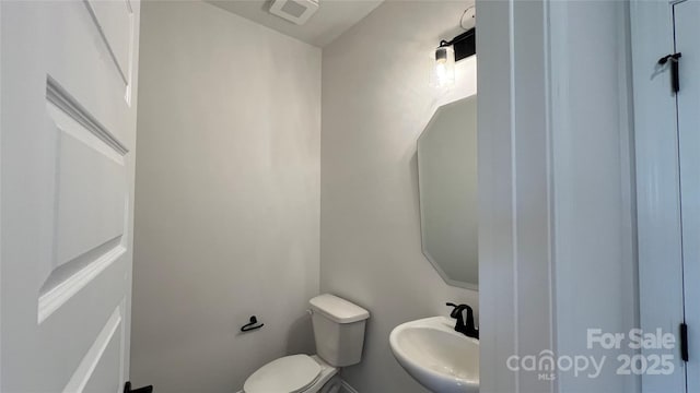 102 Cartington Way Unit Haf0042, Mooresville, NC 28115 - half bathroom with a sink and toilet