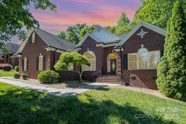 3917 Erskine Woods Dr, Bessemer City, NC 28016 - traditional-style house featuring a yard, brick siding, and roof with shingles