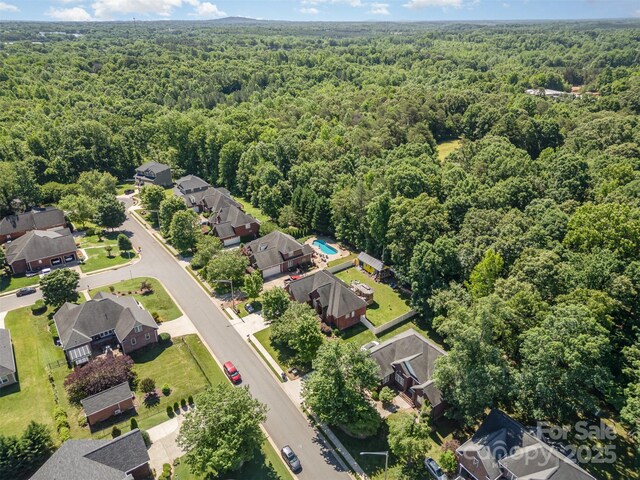 3917 Erskine Woods Dr, Bessemer City, NC 28016 - aerial view of residential area with a forest