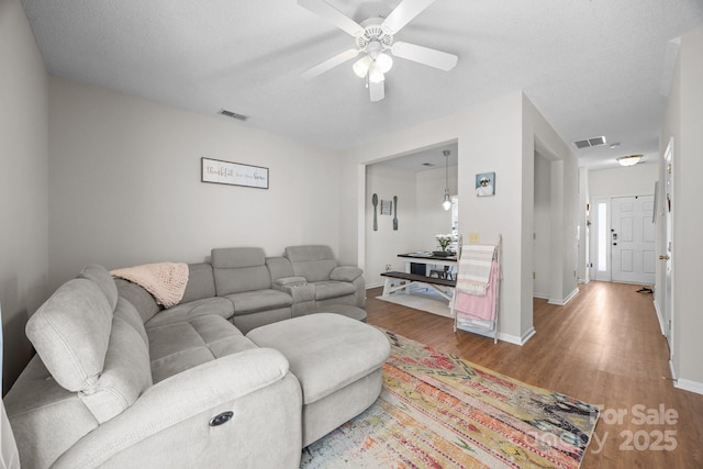740 Tavern Ct Unit 7, Rock Hill, SC 29732 - living room featuring wood finished floors, ceiling fan, and baseboards