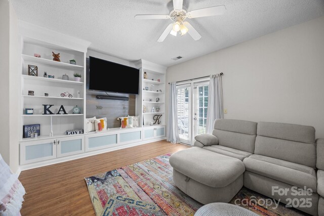 740 Tavern Ct Unit 7, Rock Hill, SC 29732 - living area with a textured ceiling, wood finished floors, and ceiling fan