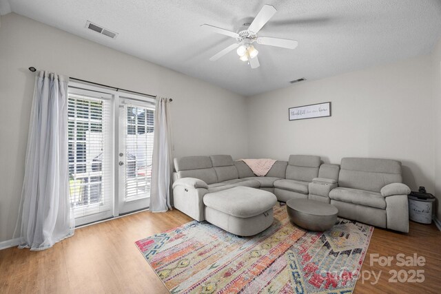 740 Tavern Ct Unit 7, Rock Hill, SC 29732 - living area featuring wood finished floors, ceiling fan, and a textured ceiling