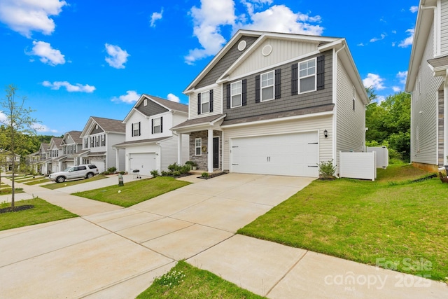 5204 Belstone Ln, Charlotte, NC 28215 - view of front of house featuring an attached garage, a residential view, driveway, board and batten siding, and a front yard