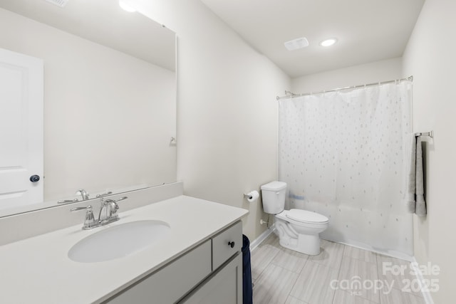 5204 Belstone Ln, Charlotte, NC 28215 - bathroom featuring vanity and toilet