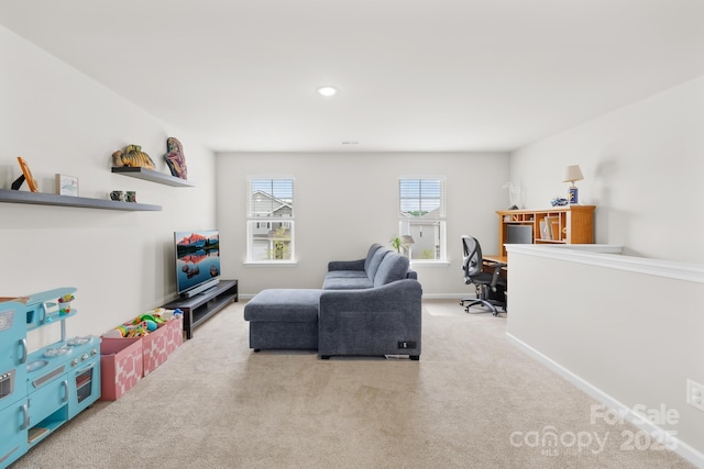 5204 Belstone Ln, Charlotte, NC 28215 - carpeted living room with an office area, baseboards, and recessed lighting