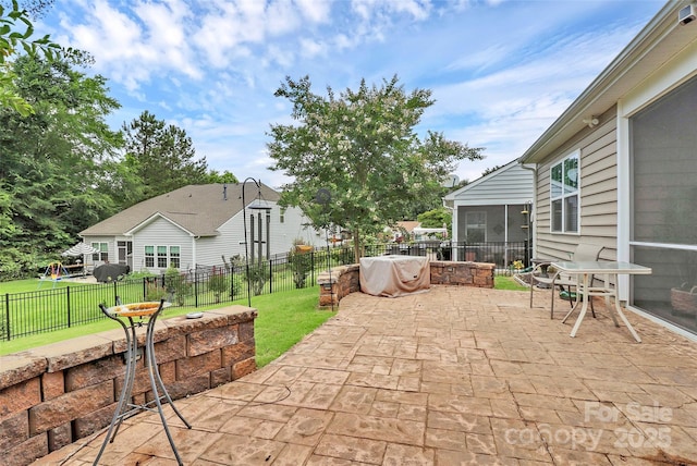 12014 Belmont Mansion Dr, Charlotte, NC 28273 - view of patio featuring a sunroom