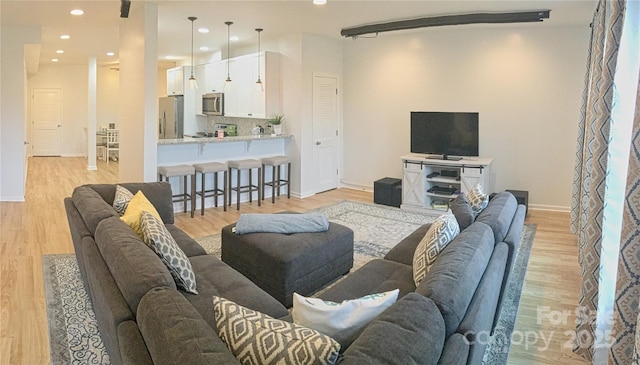 3416 Yarmouth Ln, Gastonia, NC 28056 - living room with light wood-style flooring, recessed lighting, and baseboards