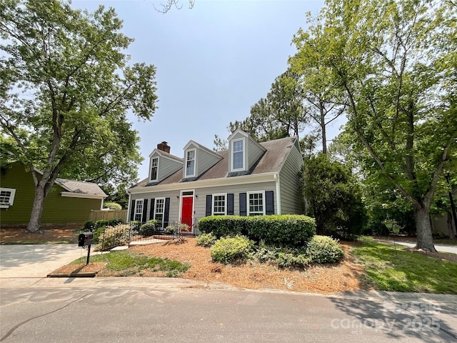 2619 Quailrush Rd, Charlotte, NC 28226 - cape cod house featuring a chimney