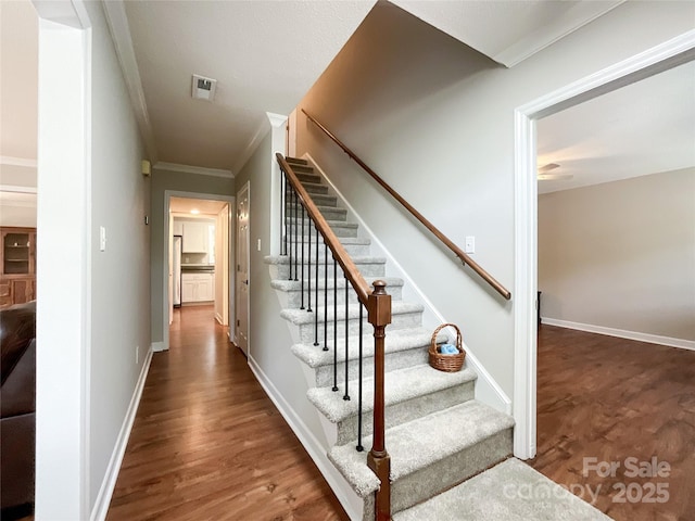 2619 Quailrush Rd, Charlotte, NC 28226 - stairs featuring wood finished floors, ornamental molding, baseboards, and ceiling fan