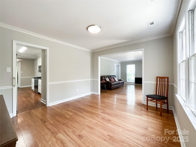2619 Quailrush Rd, Charlotte, NC 28226 - spare room with light wood-style floors, ornamental molding, and baseboards