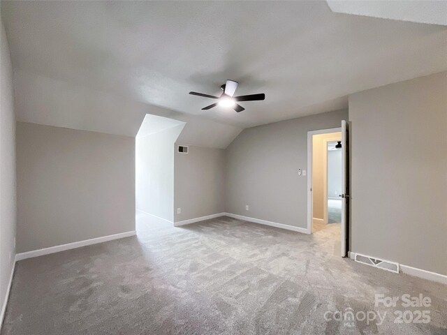 2619 Quailrush Rd, Charlotte, NC 28226 - additional living space featuring a ceiling fan, vaulted ceiling, carpet, and baseboards