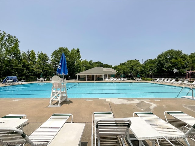 2619 Quailrush Rd, Charlotte, NC 28226 - community pool with view of scattered trees and a patio