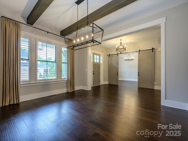 9426 Greyson Ridge Dr, Charlotte, NC 28277 - spare room with a barn door, a chandelier, baseboards, wood finished floors, and beamed ceiling